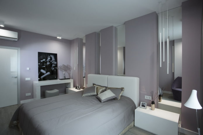 Grau-weißes Schlafzimmerinterieur